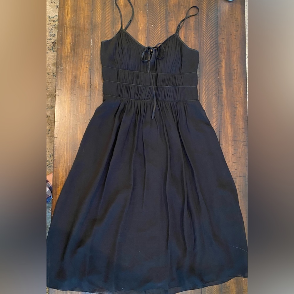 Max and Cleo black dress in size 6 with cute tie up top portion.